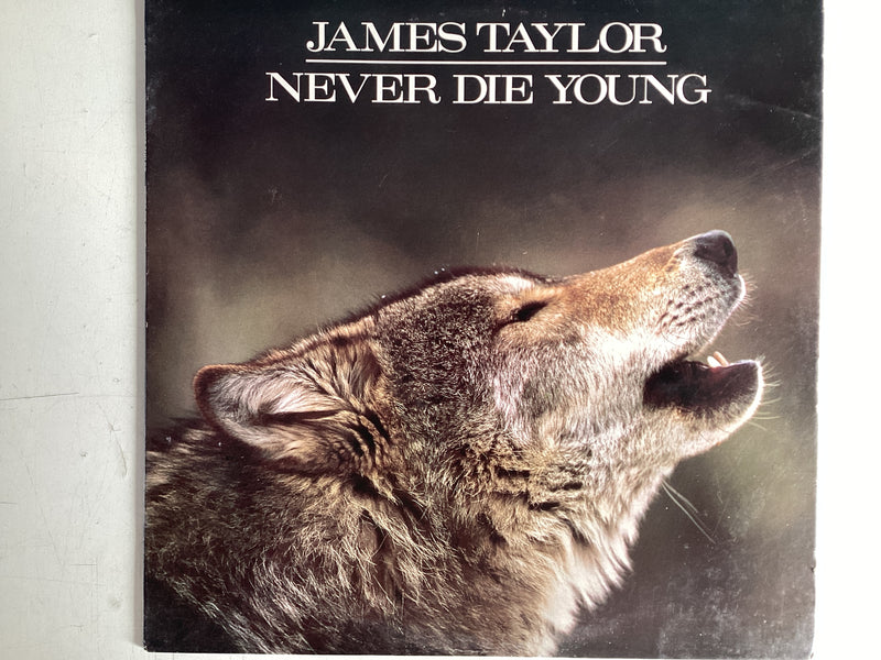 TAYLOR, JAMES = NEVER DIE YOUNG (CDA 1988) (USED)